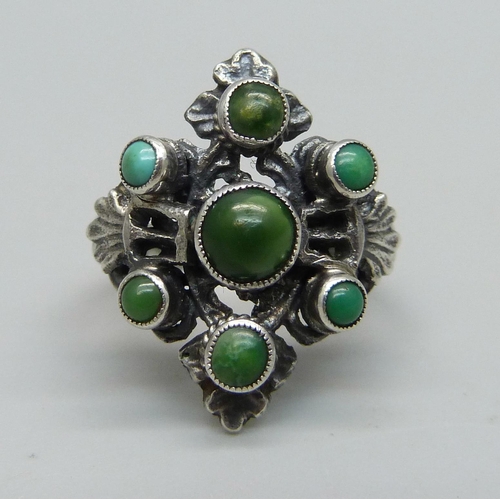 971 - An Arts and Crafts silver and turquoise set ring, marked sterling, N, (tests as silver)