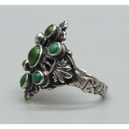 971 - An Arts and Crafts silver and turquoise set ring, marked sterling, N, (tests as silver)