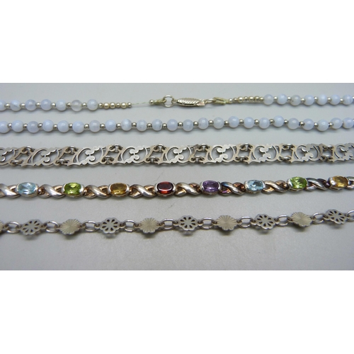 976 - Three silver bracelets and a silver and bead necklet