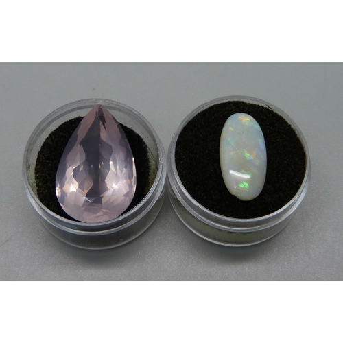 993 - An unmounted opal and rose quartz, opal 0.9g