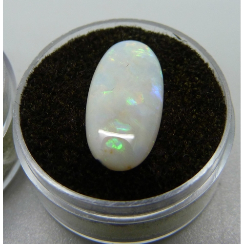 993 - An unmounted opal and rose quartz, opal 0.9g