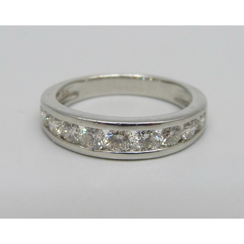 999 - A platinum, nine stone brilliant cut diamond half-eternity ring, shank stamped 1.00ct, 5.6g, M