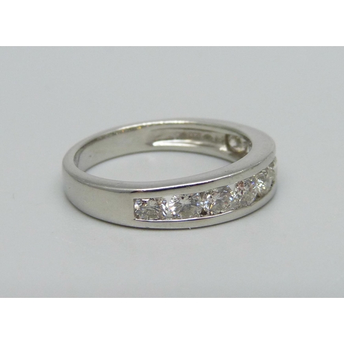 999 - A platinum, nine stone brilliant cut diamond half-eternity ring, shank stamped 1.00ct, 5.6g, M