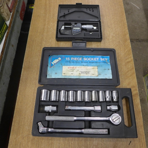 2068 - A 15 piece Hilka socket set and a Mitutoy micrometer