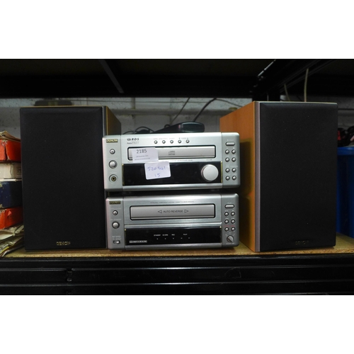 2185 - A Denon stereo and speakers, a personal component system cassette deck - (DRRM10) and a  CD receiver... 