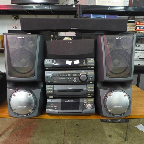 2209 - A Sony stereo with two large speakers (LBT-XB80A) and Cambridge Tu speaker base with bluetooth