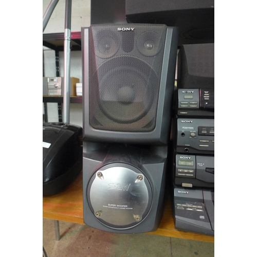 2209 - A Sony stereo with two large speakers (LBT-XB80A) and Cambridge Tu speaker base with bluetooth