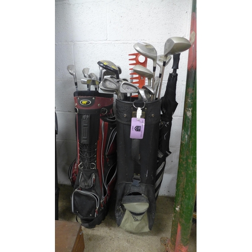 2379 - 2 Golf bags with golf clubs including Zoid, Wilson, etc.