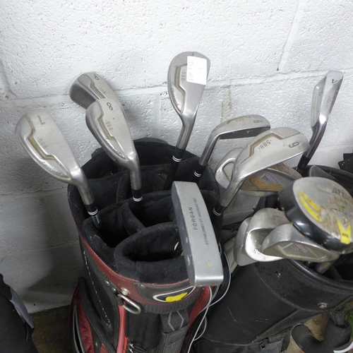 2379 - 2 Golf bags with golf clubs including Zoid, Wilson, etc.