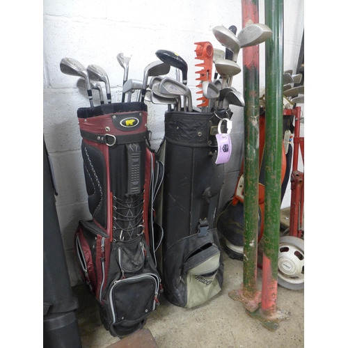 2379 - 2 Golf bags with golf clubs including Zoid, Wilson, etc.