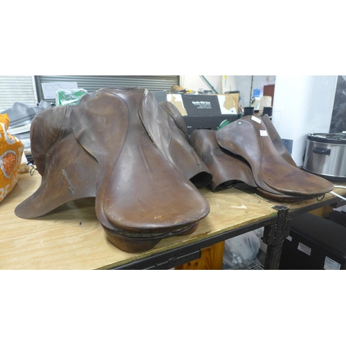 2409 - Two leather horse saddles