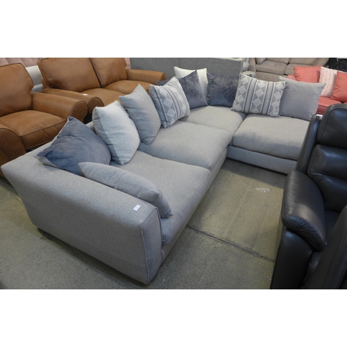 1528 - A grey hopsack corner sofa