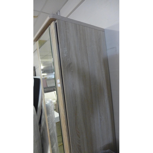 1543 - A single section mirrored wardrobe * this lot is subject to VAT