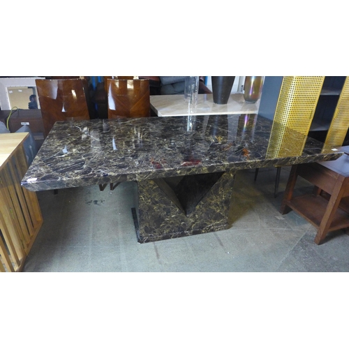 1578 - A mocha marble effect dining table with V shaped base