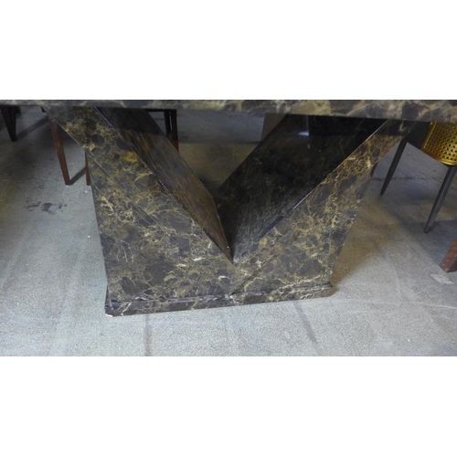 1578 - A mocha marble effect dining table with V shaped base