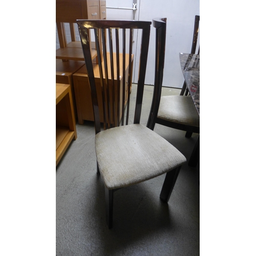 1588 - A mocha effect extending dining table with six chairs