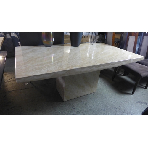 1590 - A cream marble effect dining table