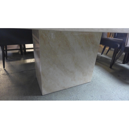 1590 - A cream marble effect dining table