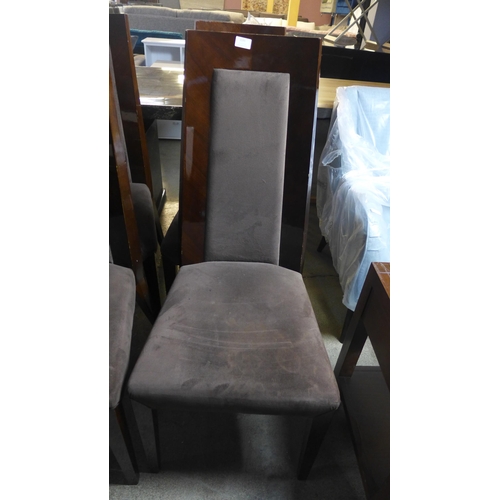 1591 - A set of four dark wood and suede effect dining chairs