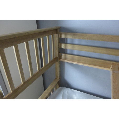 1599 - A wooden bunk bed - boxed * this lot is subject to VAT