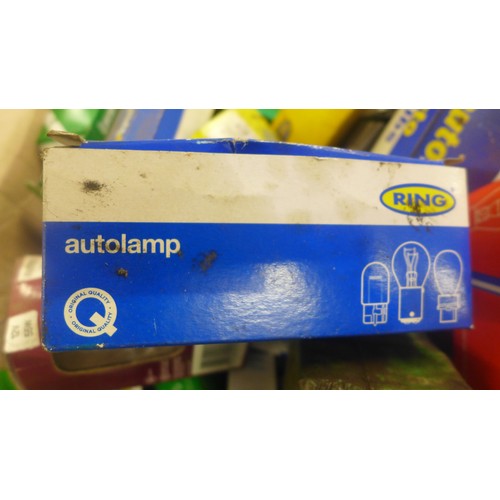 2038A - An assortment of 12v auto bulbs including Lucas, Hella, Ring, We Fit, etc., and an auto bulb shop di... 