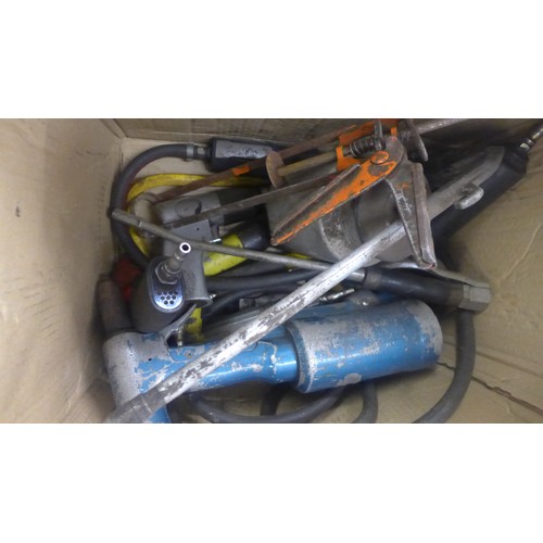 2054 - A box containing an assortment of air tools including spray gun, air wrench, air drills, three air r... 