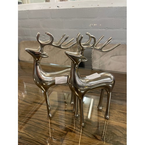 1306 - A pair of chrome reindeer ornaments