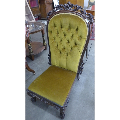 107 - A Victorian rosewood and fabric upholstered lady's chair