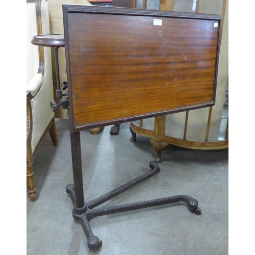 110 - A George V mahogany and cast steel adjustable reading table