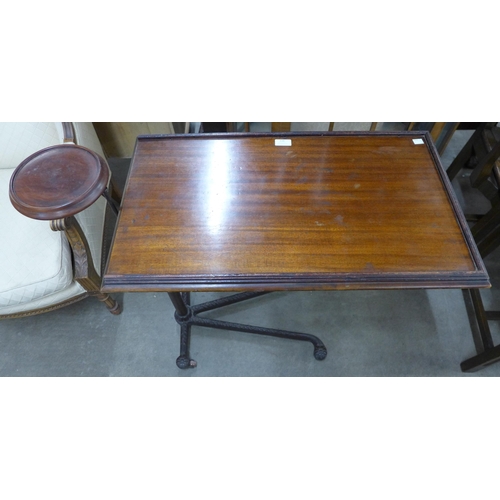 110 - A George V mahogany and cast steel adjustable reading table