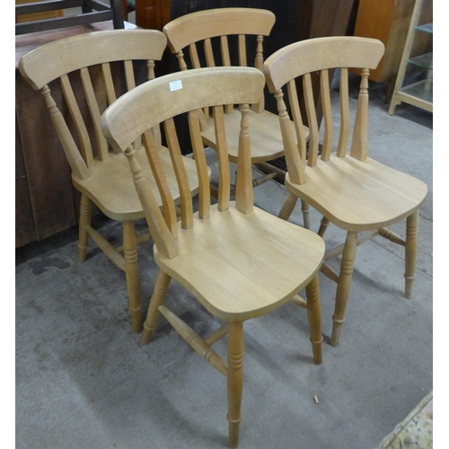 118 - A set of four beech kitchen chairs