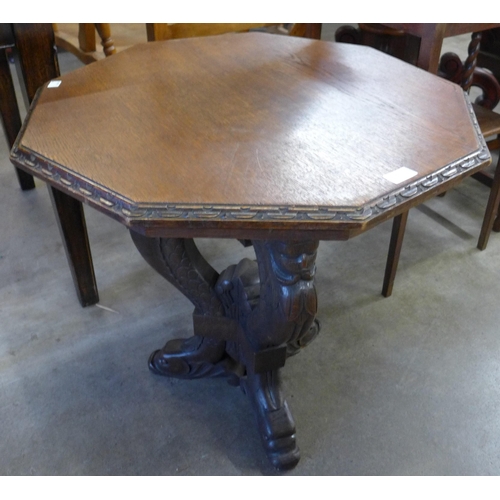 134 - A 19th Century Italian Baroque Revival carved oak octagonal centre table