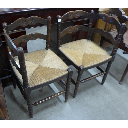 136 - A pair of early 20th Century French beech rush seated corner chairs