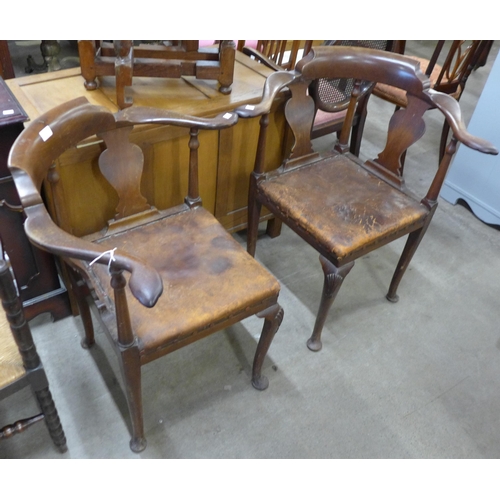 137 - A pair of George III style mahogany corner chairs