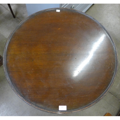 138 - A George III mahogany circular tilt top tripod tea table