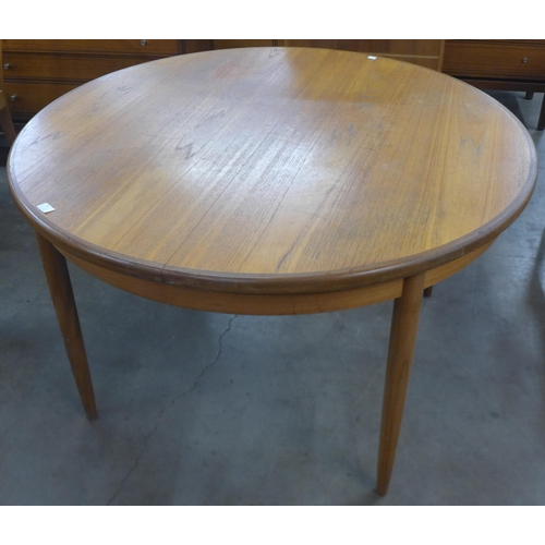 14 - A G-Plan Fresco teak circular extending dining table