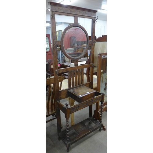 141 - An early 20th Century oak barleytwist hallstand