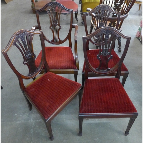 147 - A set of four Hepplewhite style mahogany dining chairs