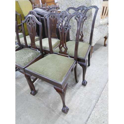 153 - A harlequin set of seven George III mahogany dining chairs