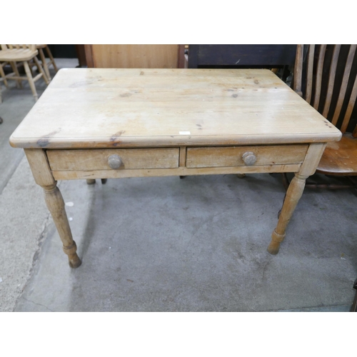 154 - A Victorian style pine two drawer kitchen table