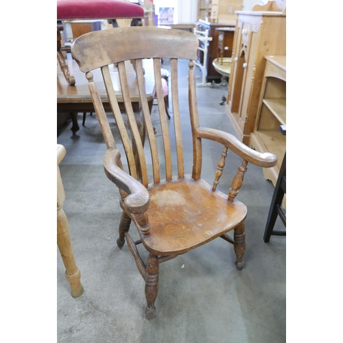 156 - A Victorian elm and beech farmhouse armchair