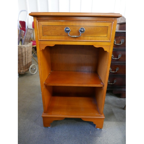 167 - A small inlaid yew single drawer bookcase