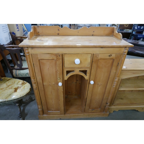 173 - A Victorian style pine two door kitchen dresser