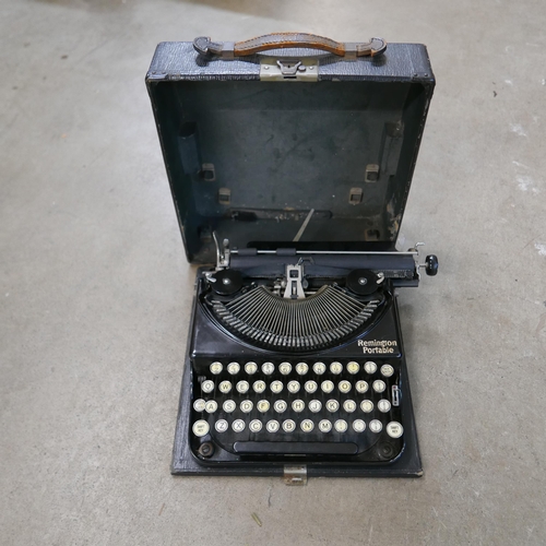 190 - A vintage Qualcast lawnmower and a Remington portable typewriter