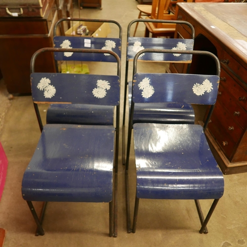 192 - A set of four mid 20th Century tubular steel stacking chairs