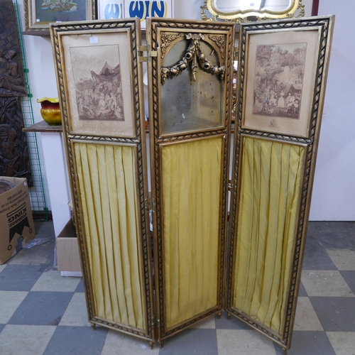 195 - A French Louis XV style gilt three panel folding dressing screen