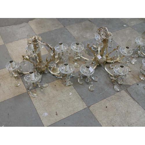 198 - A set of three gilt metal chandeliers