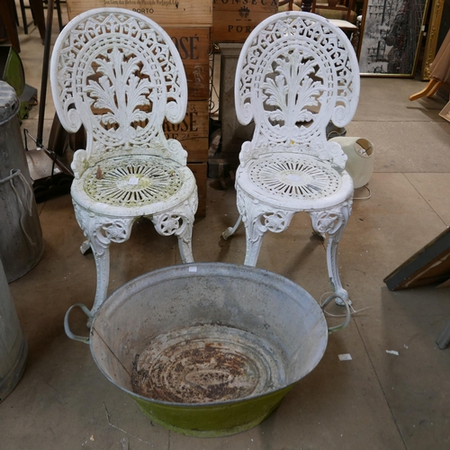 211 - A pair of cast alloy garden chairs and a galvanised tub