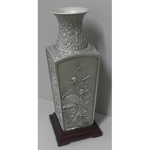 234 - A box of Royal Selangor pewter Four Seasons Collection four-sided vase with wooden stand