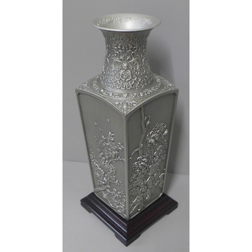 234 - A box of Royal Selangor pewter Four Seasons Collection four-sided vase with wooden stand